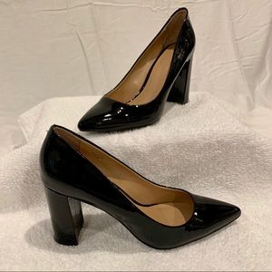Black patent leather pumps